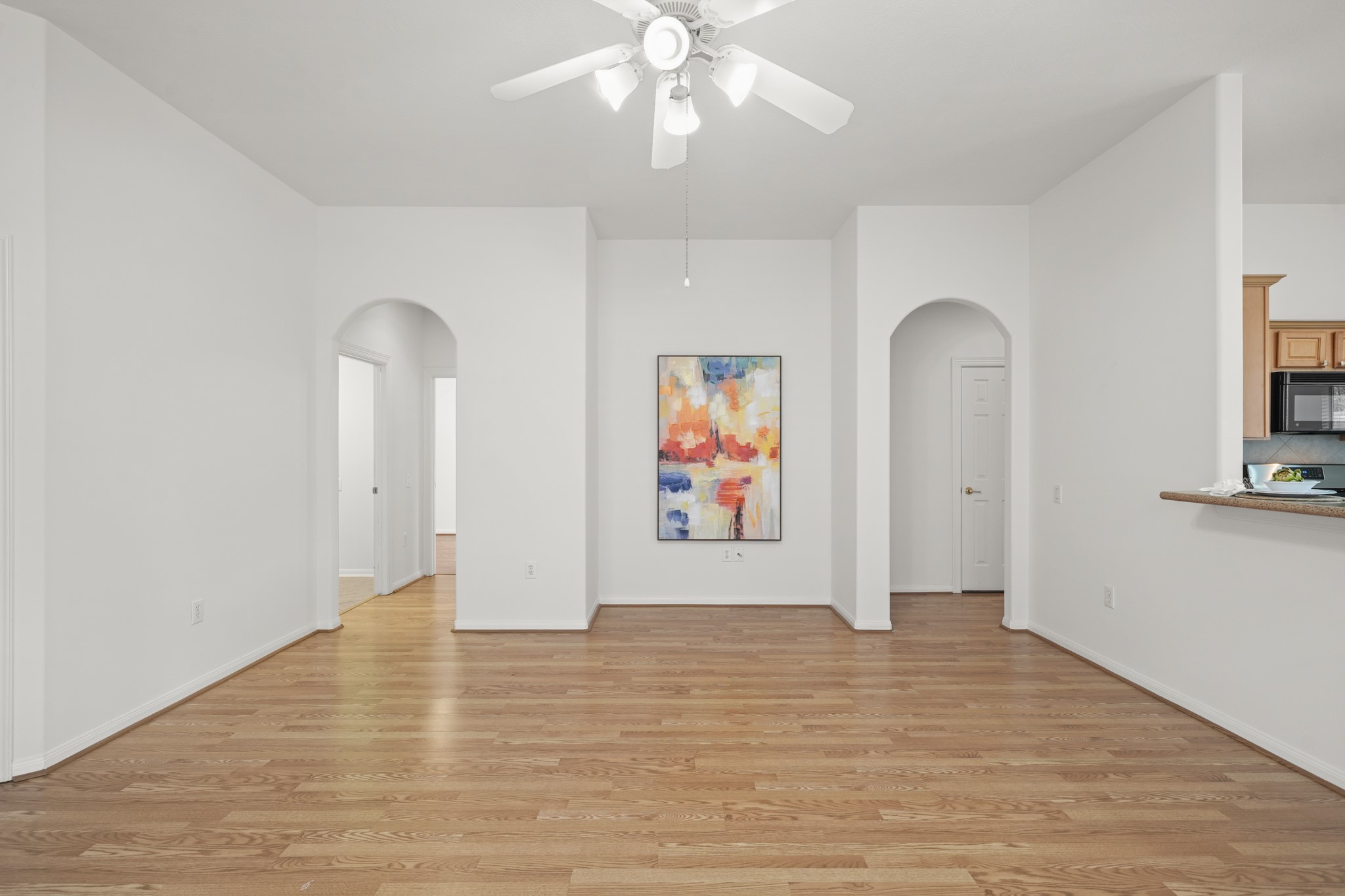 25003 Spring Ash Lane Katy, TX 77494 - Photo 9 of 43 Discover the perfect blend of style and function with a sleek TV niche in the family room, ideal for movie nights and cozy gatherings.