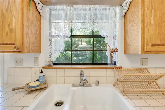a view of a porch with a tree