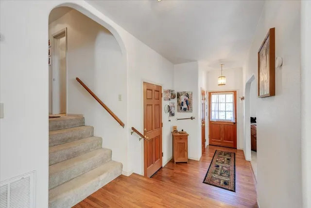a bathroom with a sink a mirror and a shower