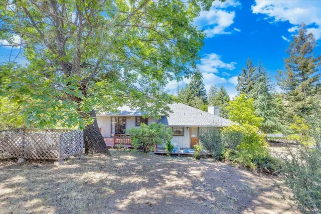 a view of a building with a door and windows
