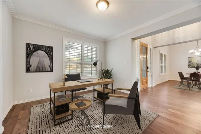 a workspace with furniture and window