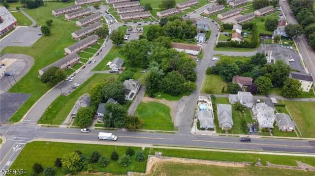 an aerial view of a house with outdoor space swimming pool outdoor seating and entertaining space