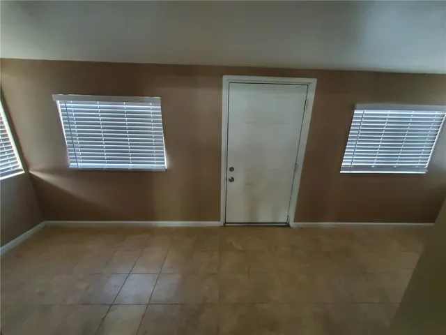 a view of livingroom with kitchen