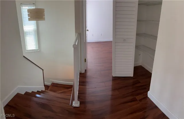 a view of entryway with wooden floor
