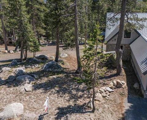 21131 Donner Pass Road Soda Springs, CA 95728 - Photo 3 of 6 a backyard of a house with lots of green space