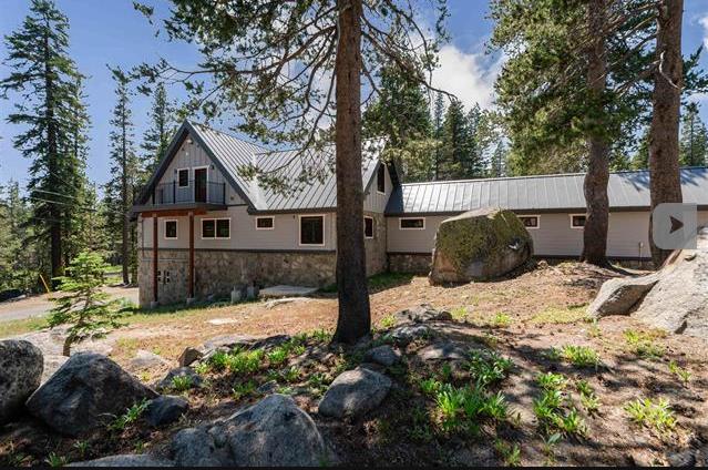 21131 Donner Pass Road Soda Springs, CA 95728 - Photo 6 of 6 a view of a house with a yard covered in snow
