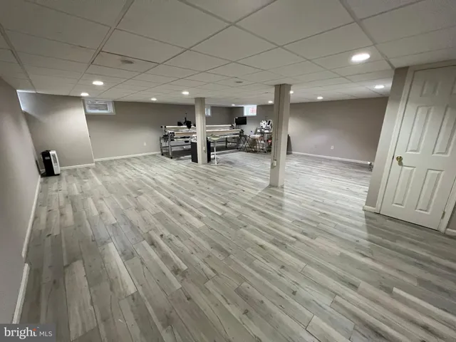 an empty room with a bench