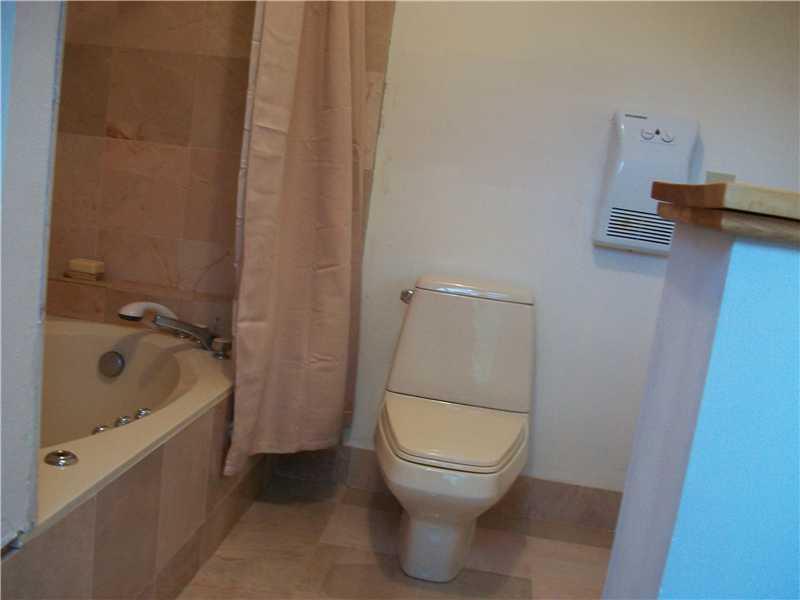 25 Commissary Point Road Lubec, ME 04652 - Photo 18 of 20 Bathroom. Bath has marbel surround...