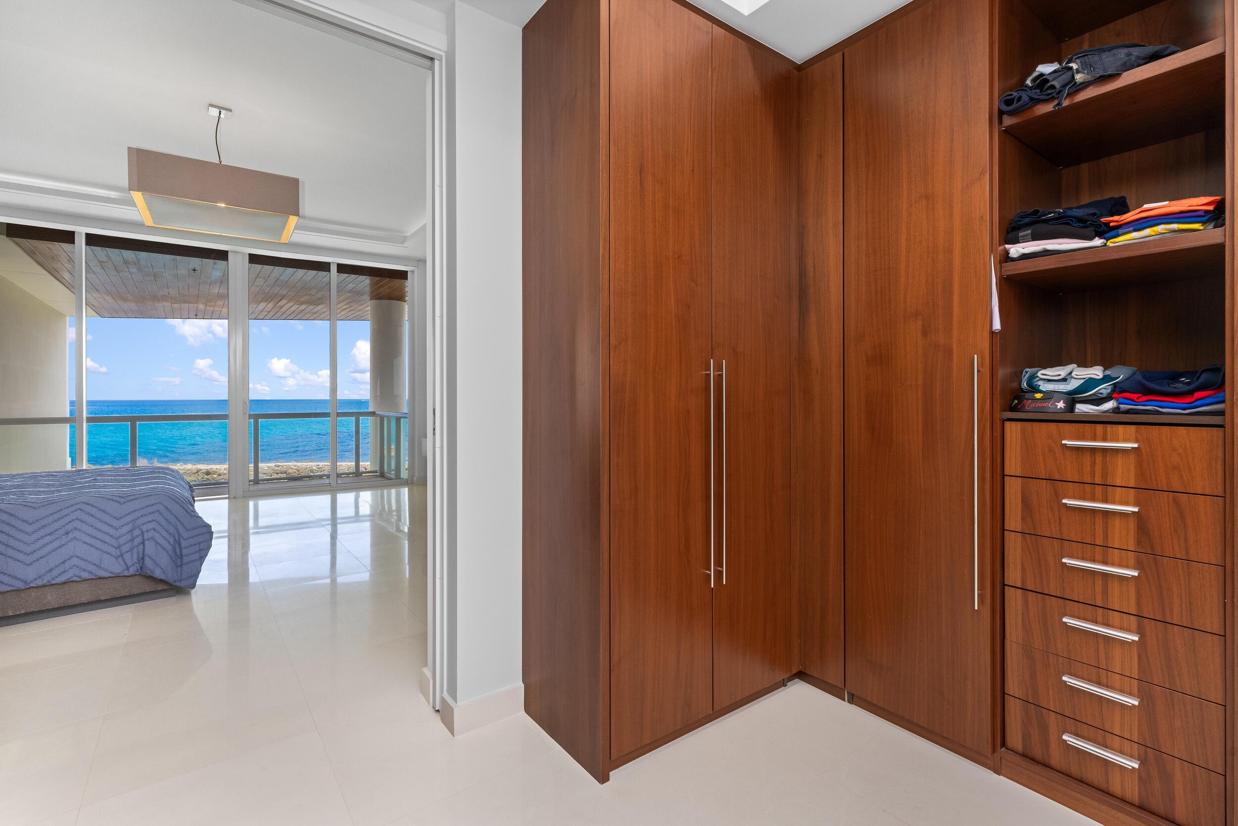 1000 South Ocean Boulevard, Unit 103 Boca Raton, FL 33432 - Photo 44 of 61 Primary closet upper