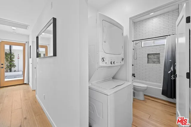 a view of bathroom with a toilet sink and tub