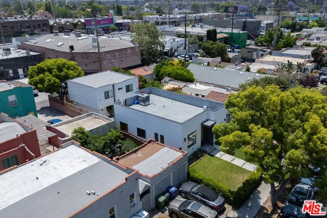 an aerial view of a city with lots of residential buildings