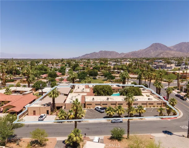 an aerial view of residential houses and city view