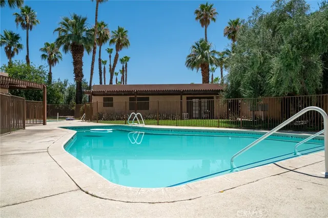 a view of a house with swimming pool