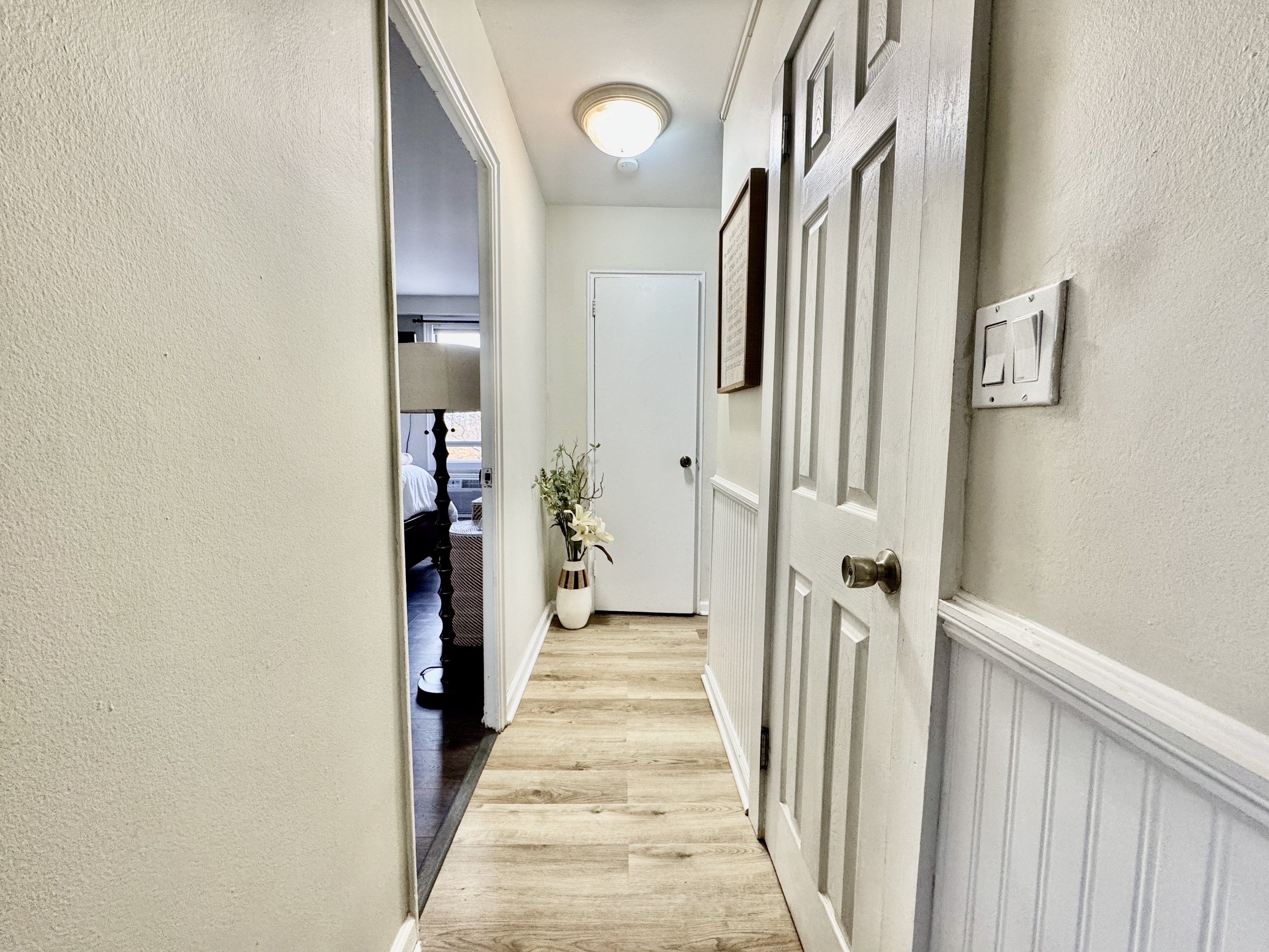 71 Strawberry Hill Avenue, Unit 421 Stamford, CT 06902 - Photo 16 of 31 a view of a hallway with wooden floor and staircase
