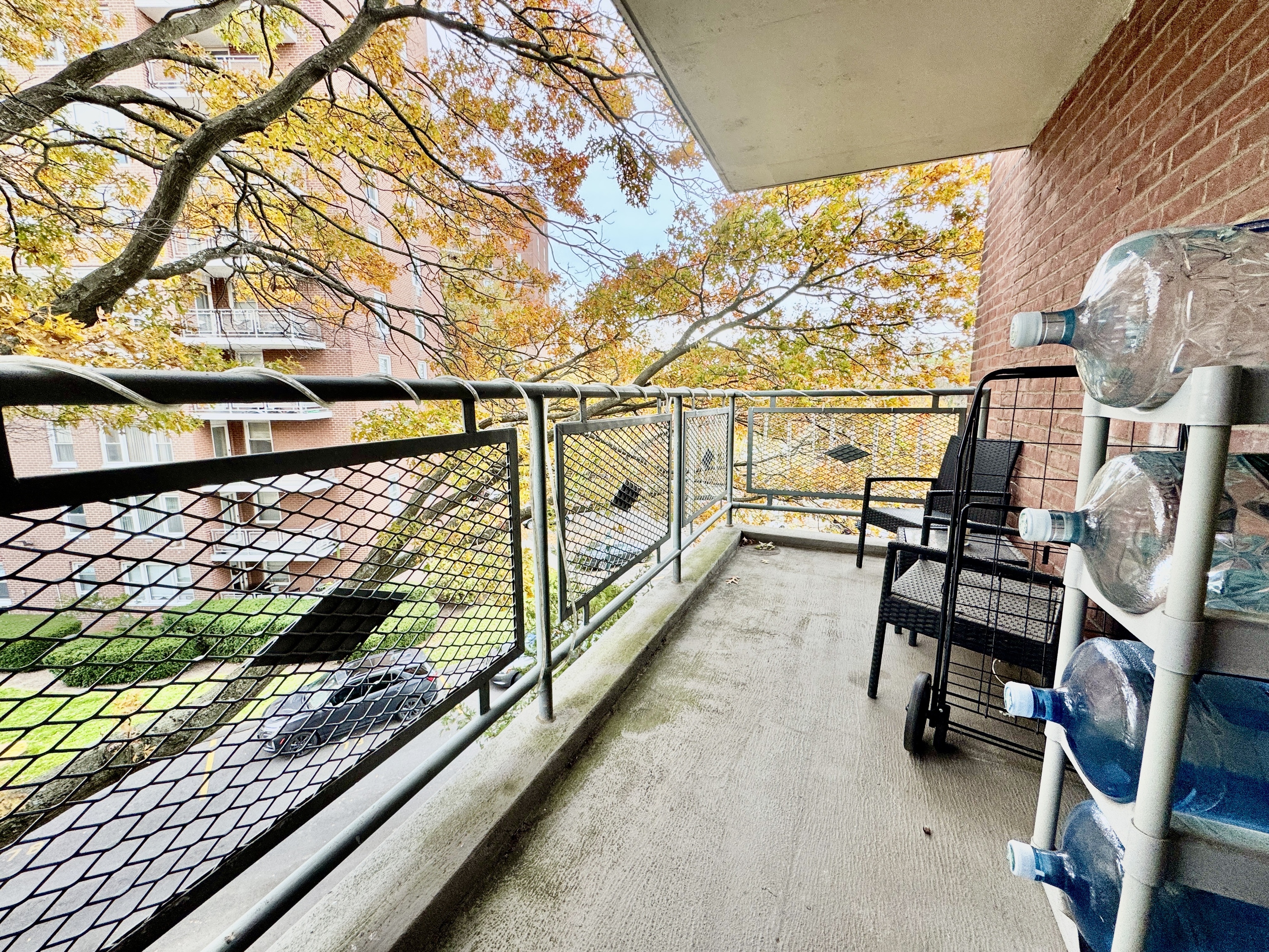 71 Strawberry Hill Avenue, Unit 421 Stamford, CT 06902 - Photo 20 of 31 a view of a balcony with chairs
