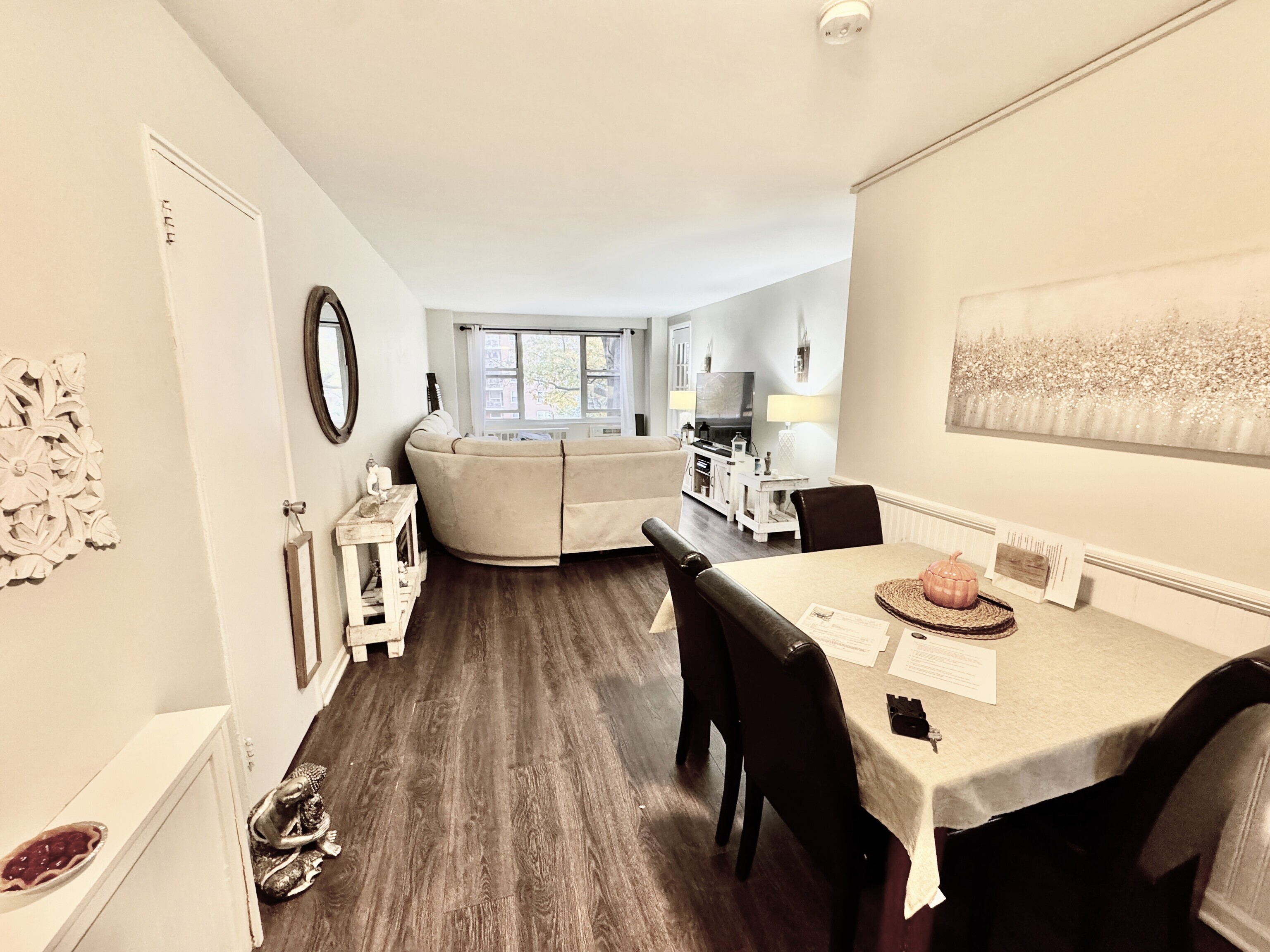71 Strawberry Hill Avenue, Unit 421 Stamford, CT 06902 - Photo 9 of 31 a dining room with furniture and wooden floor