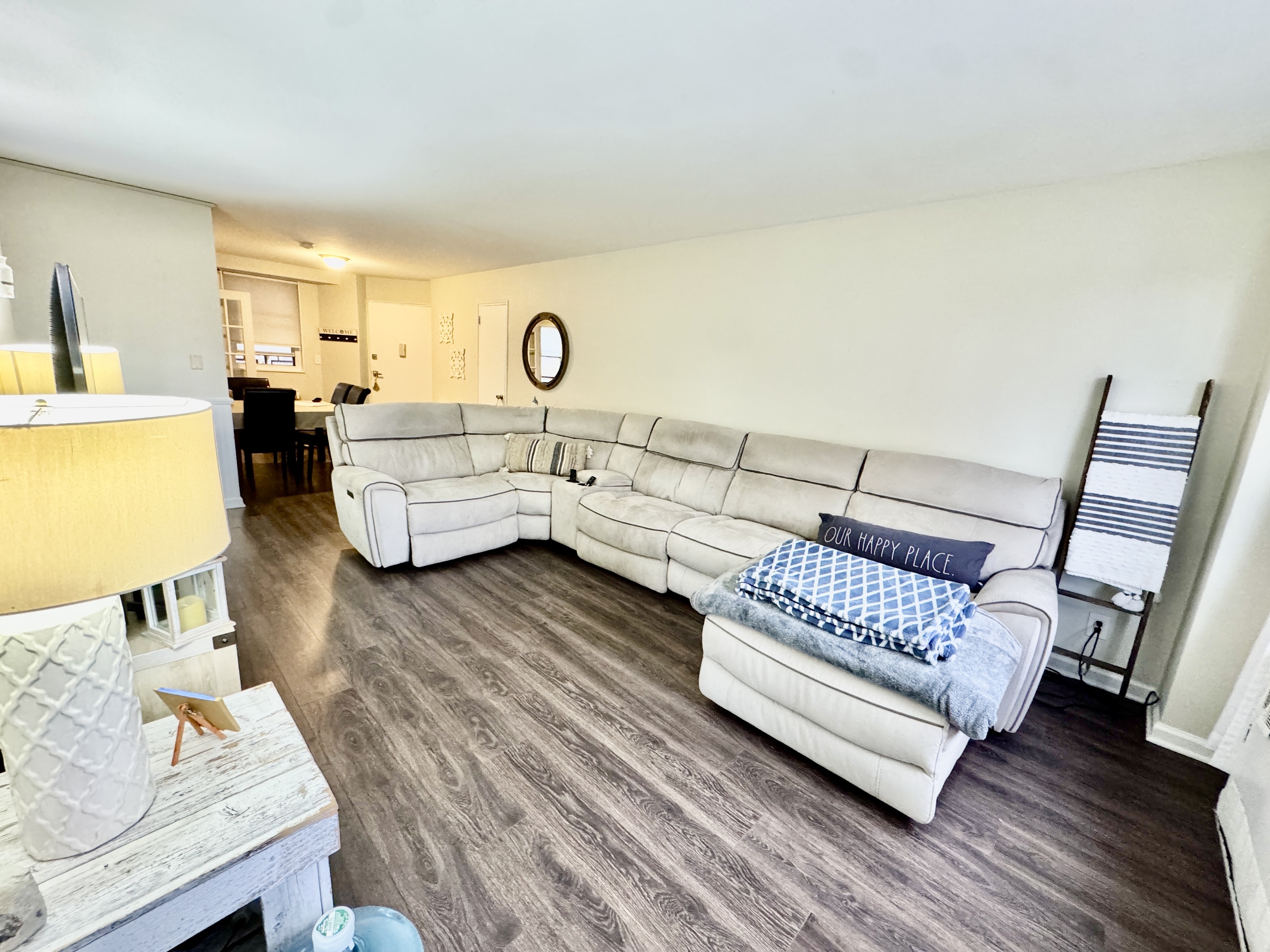 71 Strawberry Hill Avenue, Unit 421 Stamford, CT 06902 - Photo 10 of 31 a living room with furniture and wooden floor