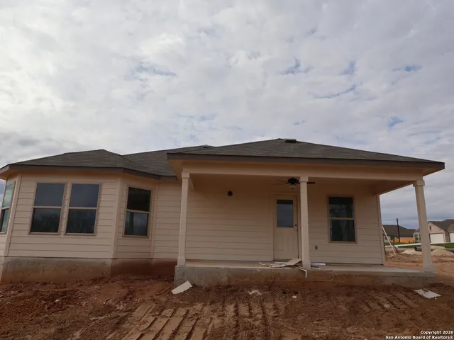 a front view of a house with garage