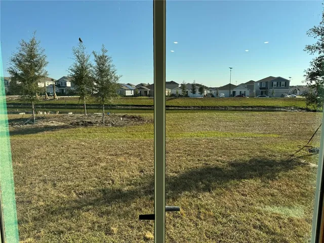 a view of a lake with houses
