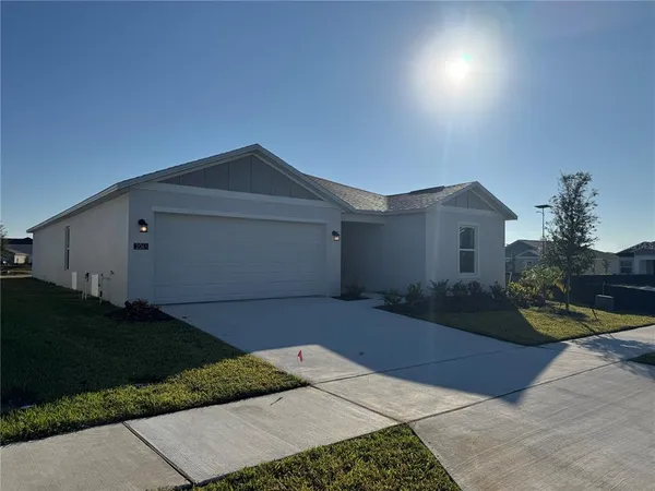 a house view with a garden space