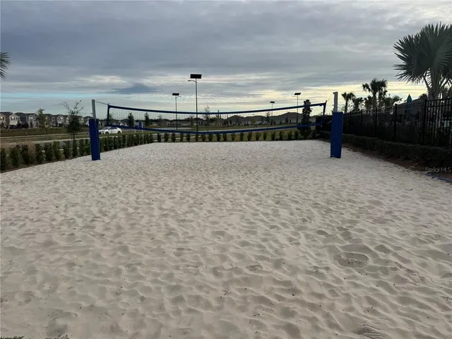 a view of swimming pool with seating space
