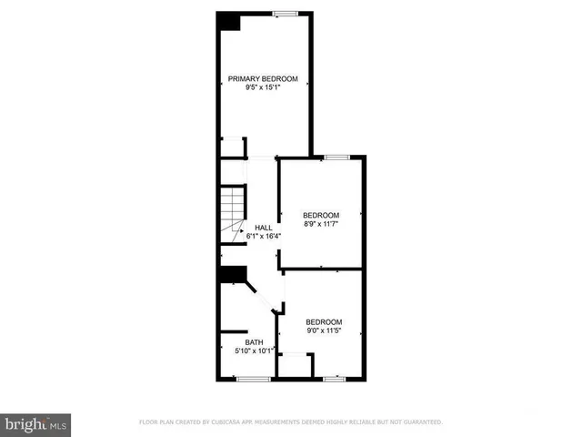 a picture of a bench in front of a wall