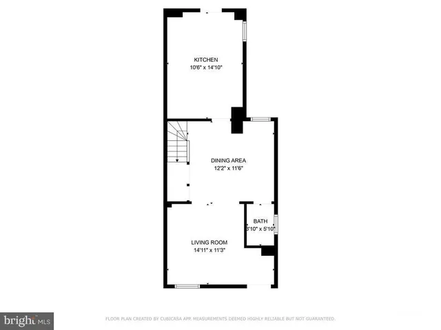 a picture of a bench in front of a building