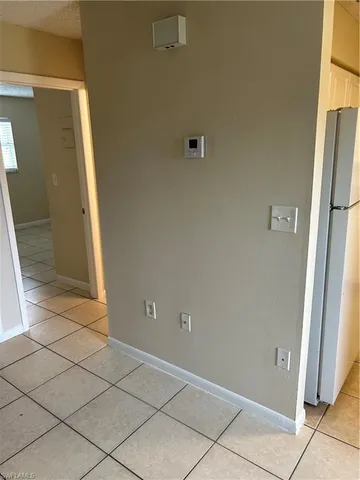 a view of a room that has a window in it