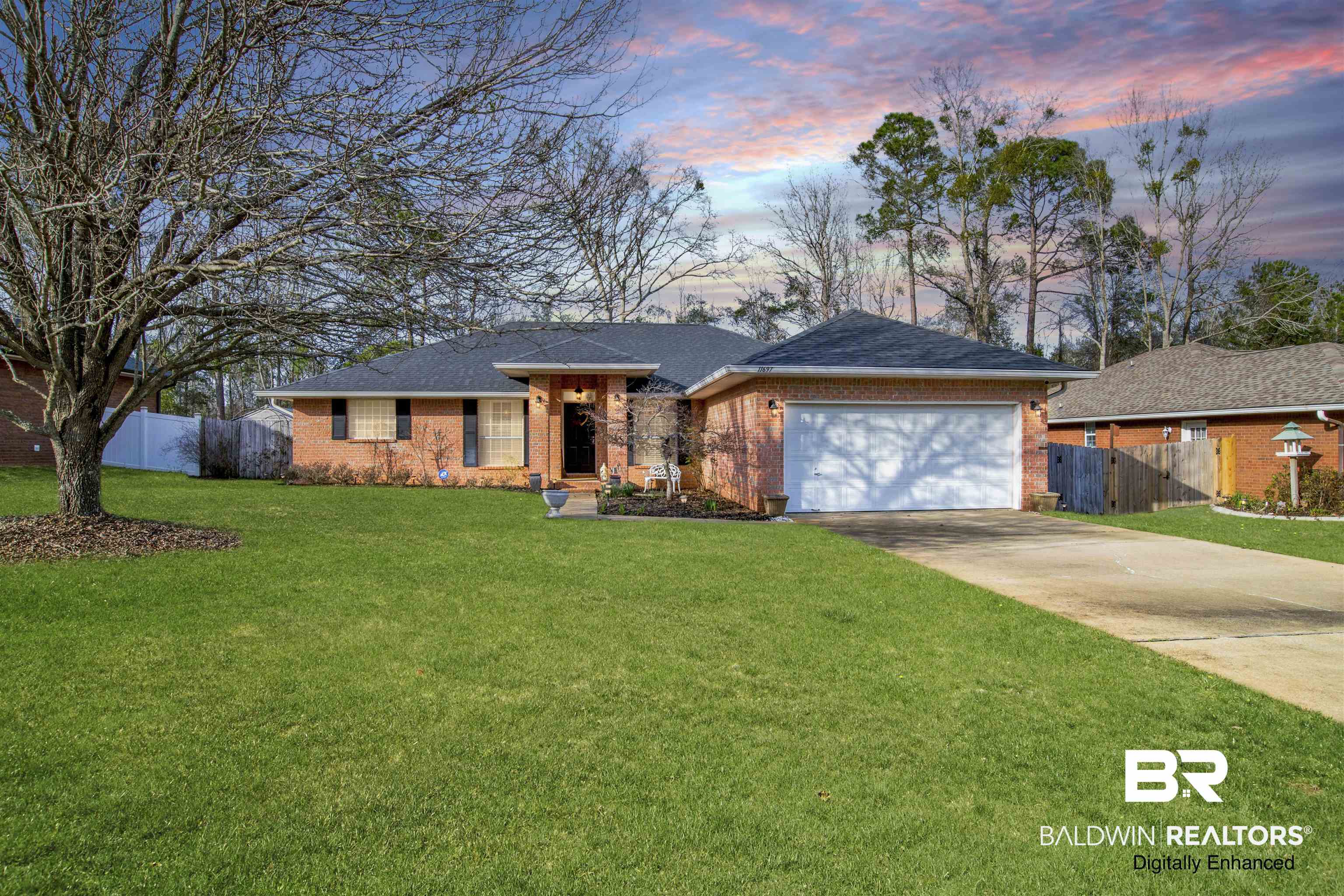 11697 Balsam Court Daphne, AL 36527 - Photo 7 of 31 Ranch-style home with driveway, brick siding, fence, and an attached garage. Virtually Modified Photo.