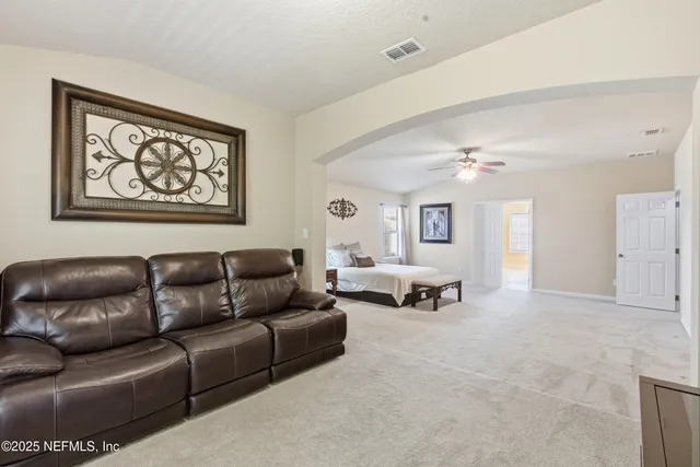 a view of livingroom with furniture and window