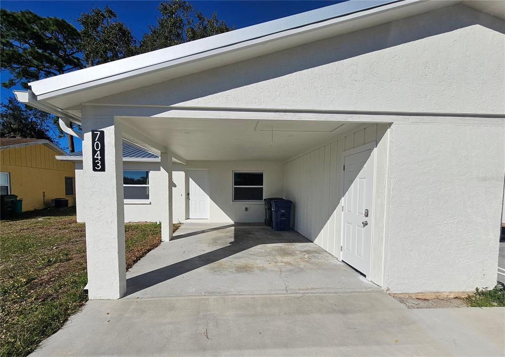 7043 Brentford Road Sarasota, FL 34241 - Photo 2 of 19 a view of a entryway front of house