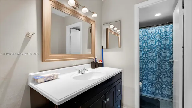 a city street lined with buildings and trees