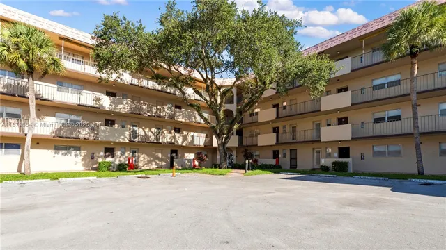 a view of a building with a street