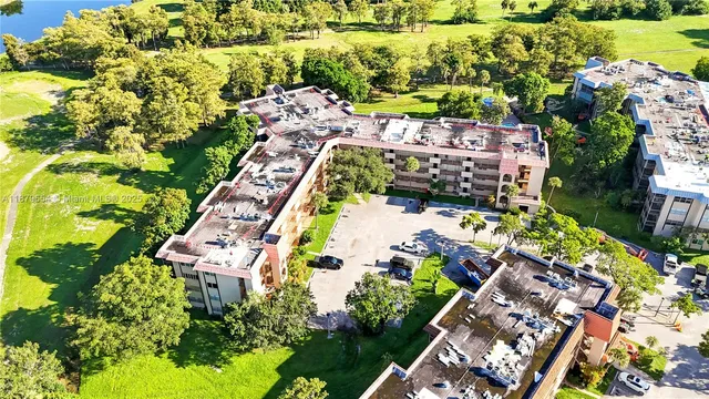 an aerial view of a house with a garden