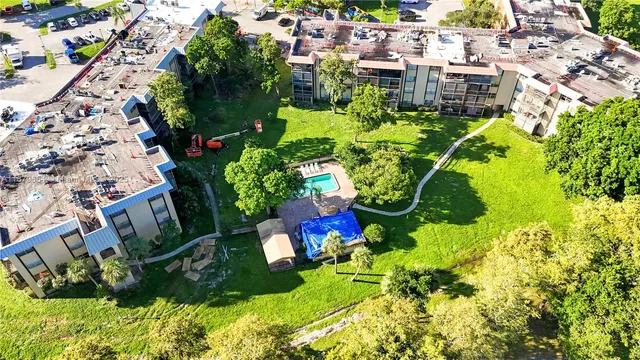 a utility room with cabinets washer and dryer