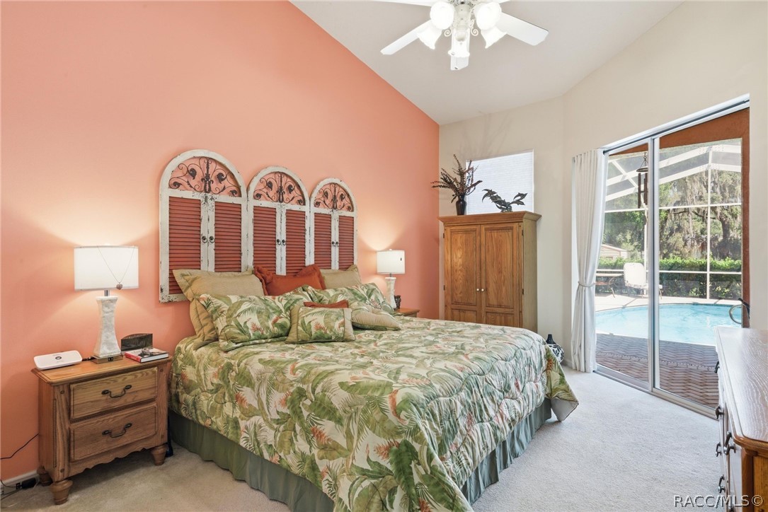 8204 East Fairway Loop Inverness, FL 34450 - Photo 28 of 71 Primary Bedroom and sliders to Lanai