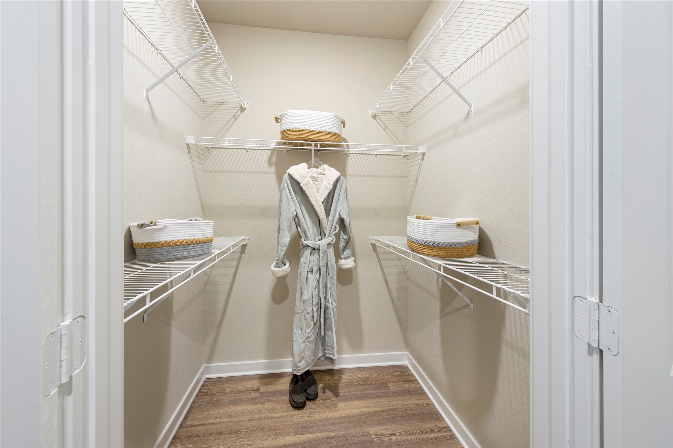 1616 Partnership Way, Unit 1234 Katy, TX 77449 - Photo 15 of 22 a view of a room with racks on the wall