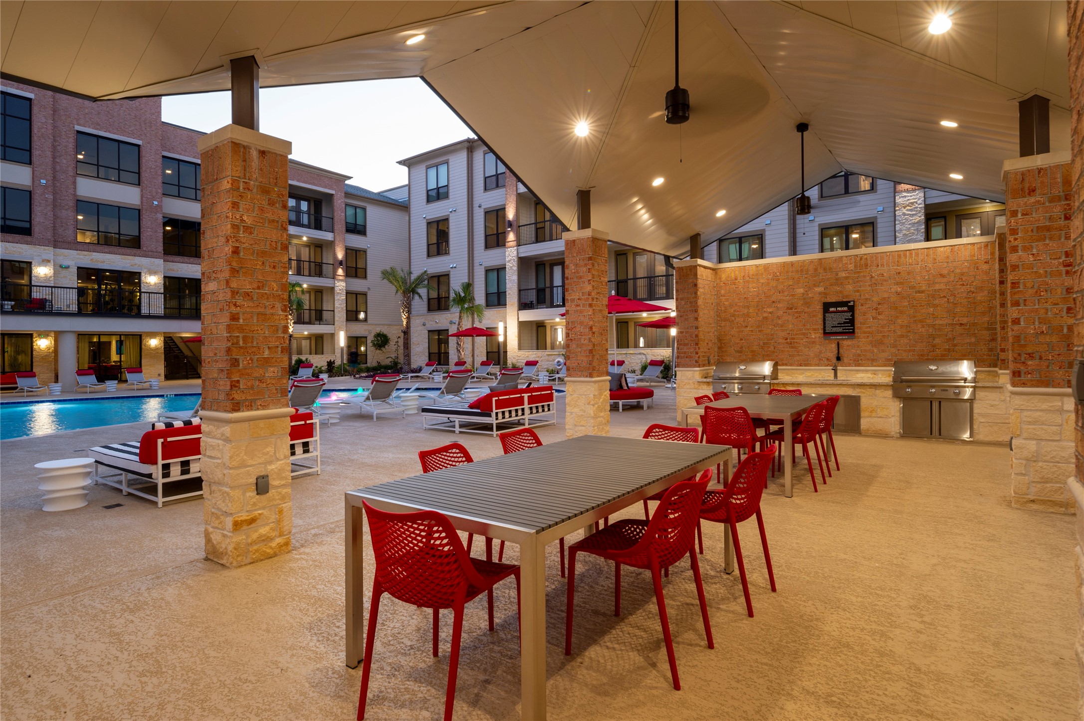 1616 Partnership Way, Unit 1234 Katy, TX 77449 - Photo 5 of 22 a outdoor dining space with furniture and a potted plant