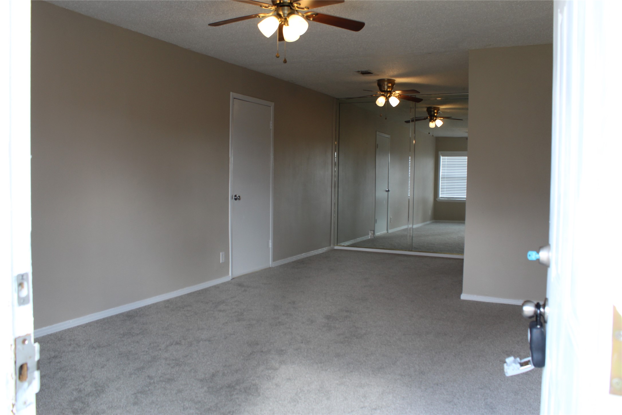 13307 Force Street Houston, TX 77015 - Photo 7 of 18 a view of a chandelier fan in big room