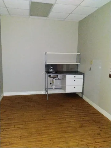 a view of room and hardwood