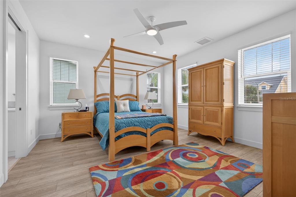 314 6th Avenue Indian Rocks Beach, FL 33785 - Photo 28 of 60 a bedroom with furniture and a window