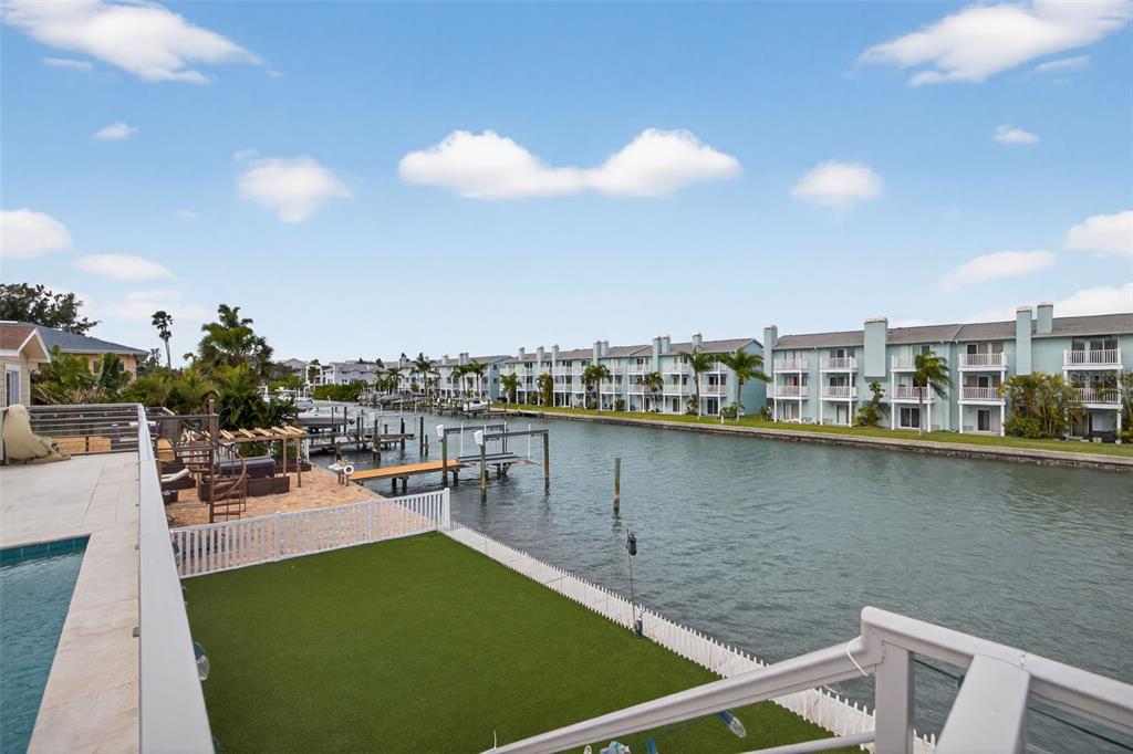 314 6th Avenue Indian Rocks Beach, FL 33785 - Photo 41 of 60 a view of a swimming pool and outdoor seating