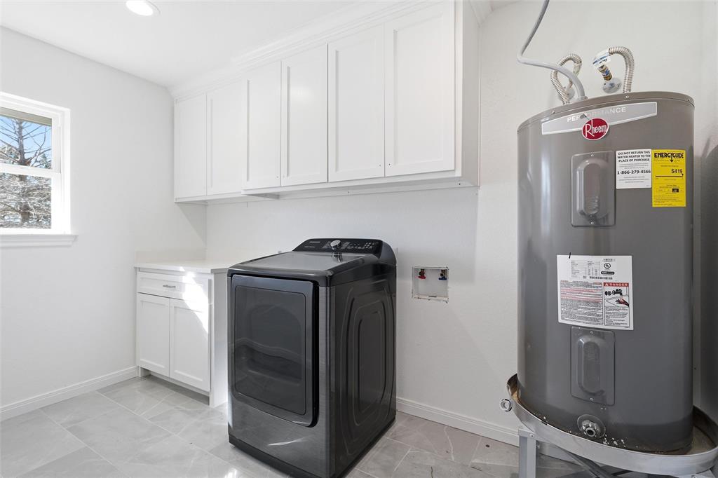 301 West Tinsley Road Robinson, TX 76706 - Photo 15 of 40 a utility room with dryer and washer