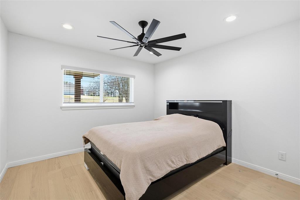 301 West Tinsley Road Robinson, TX 76706 - Photo 18 of 40 a bedroom with a bed and window