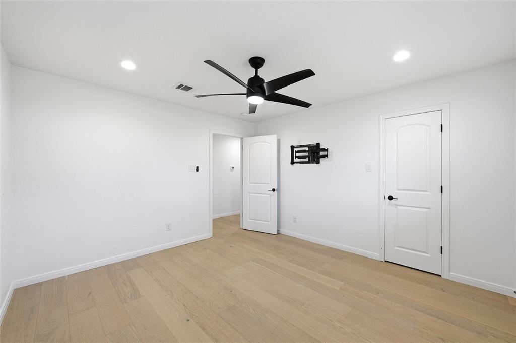 301 West Tinsley Road Robinson, TX 76706 - Photo 22 of 40 wooden floor in an empty room