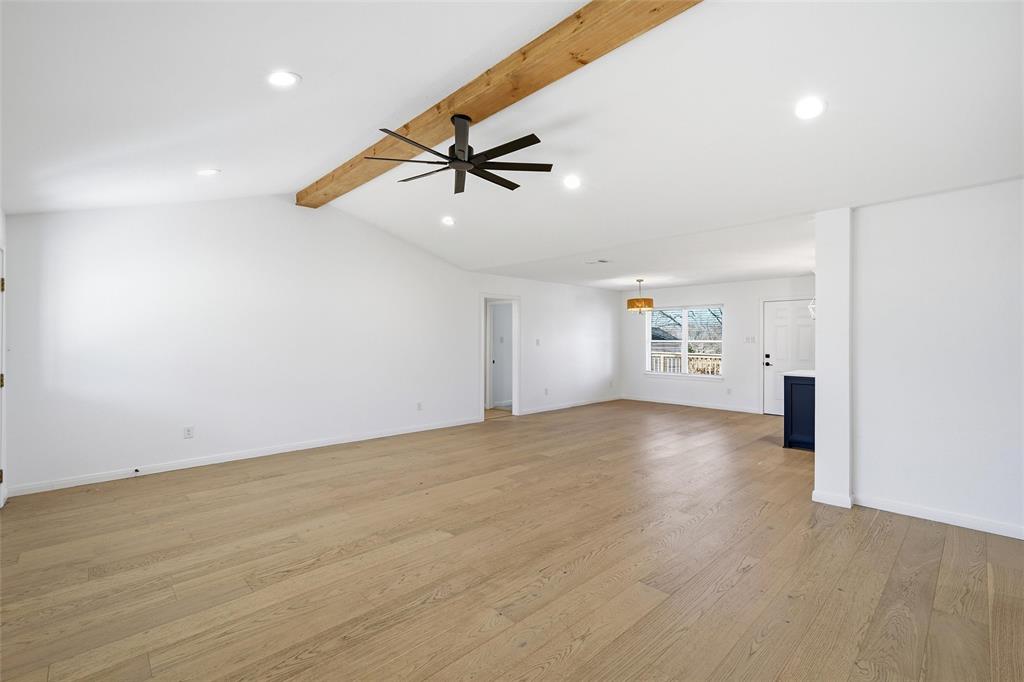 301 West Tinsley Road Robinson, TX 76706 - Photo 5 of 40 an empty room with windows and fan