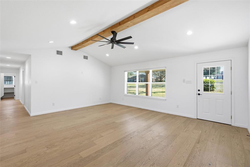 301 West Tinsley Road Robinson, TX 76706 - Photo 6 of 40 wooden floor in an empty room with a window