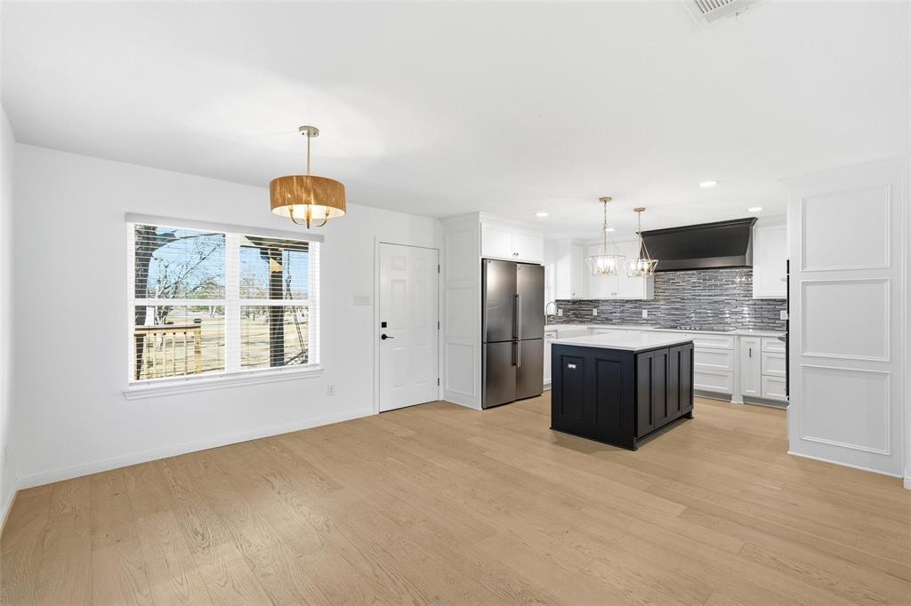 301 West Tinsley Road Robinson, TX 76706 - Photo 7 of 40 a kitchen with stainless steel appliances a refrigerator sink and cabinets