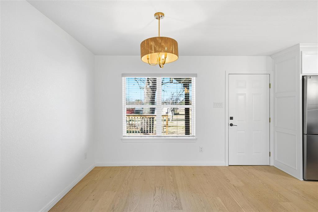 301 West Tinsley Road Robinson, TX 76706 - Photo 9 of 40 a view of an empty room with a window