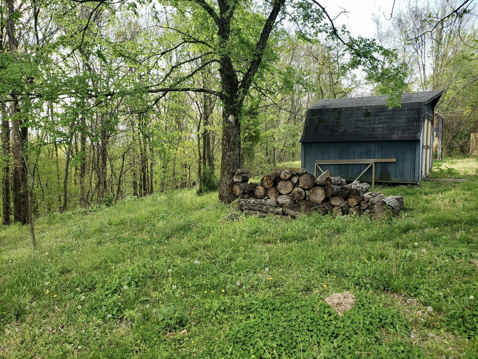 475 Bettis Road Lebanon, TN 37090 - Photo 3 of 7 a backyard of a house with table and chairs